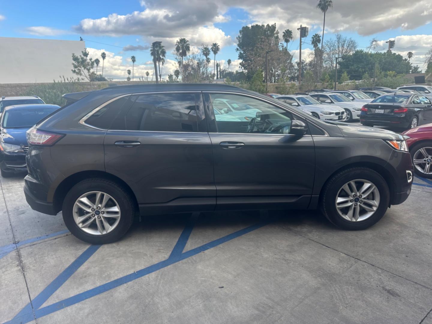 2016 Gray /Black Ford Edge SEL AWD (2FMPK4J93GB) with an 2.0L L4 DOHC 16V engine, 6A transmission, located at 30 S. Berkeley Avenue, Pasadena, CA, 91107, (626) 248-7567, 34.145447, -118.109398 - Photo#5